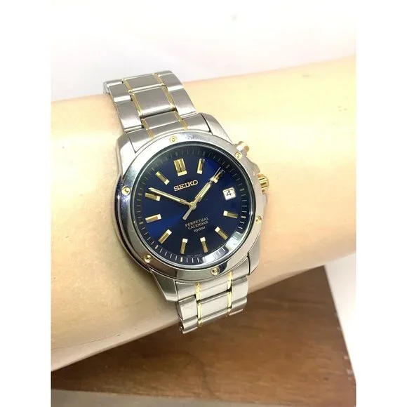 Seiko Men's Watch SNQ010 Quartz Blue Dial Perpetual Calendar Two Tone Steel 39mm